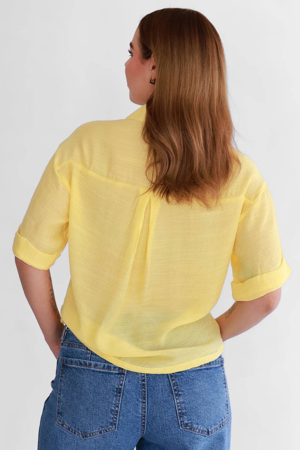 Blusa Amarilla con Botones | $220 pz